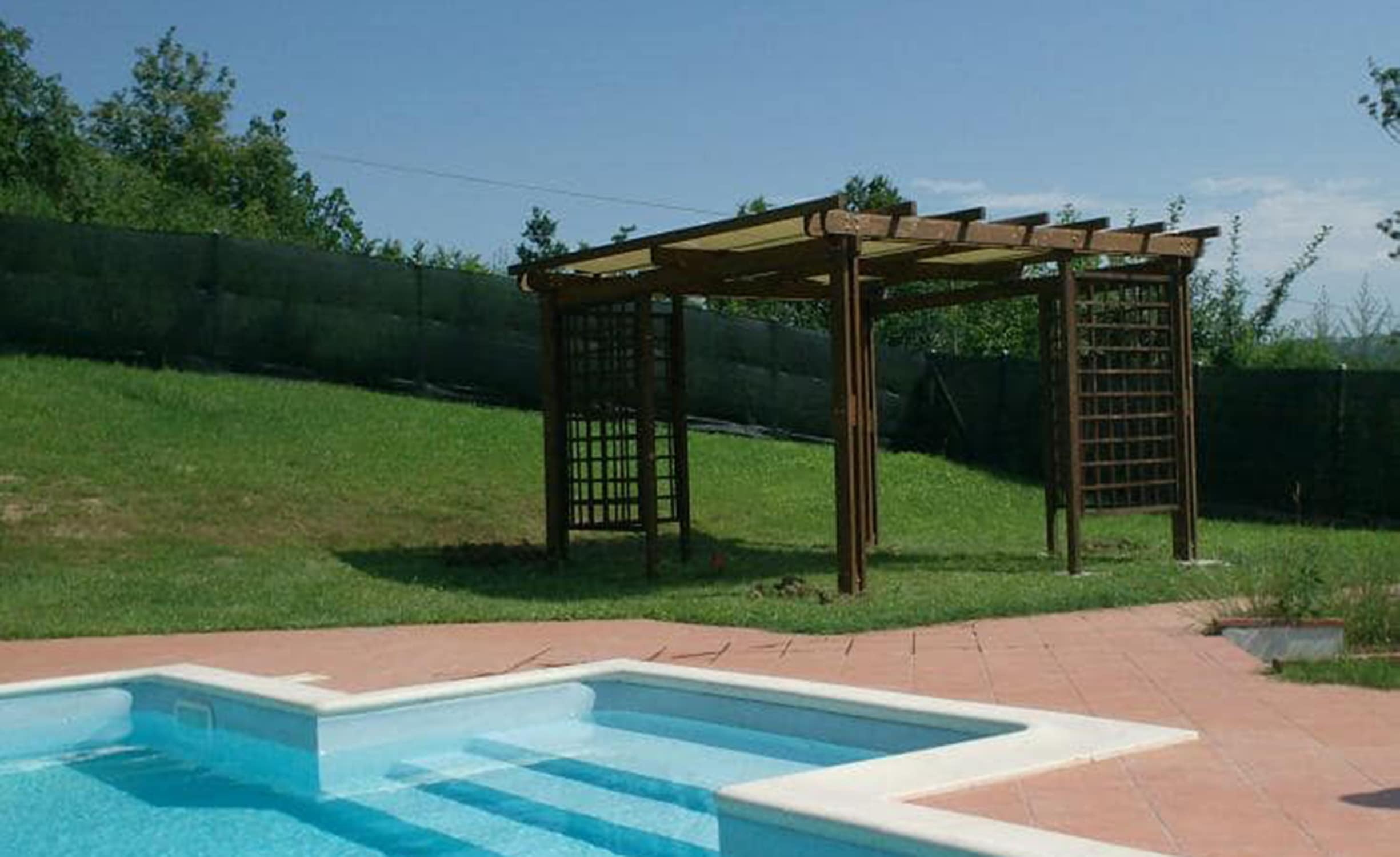 Pergola con teli a onda