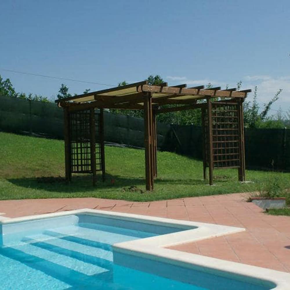 Pergola con teli a onda