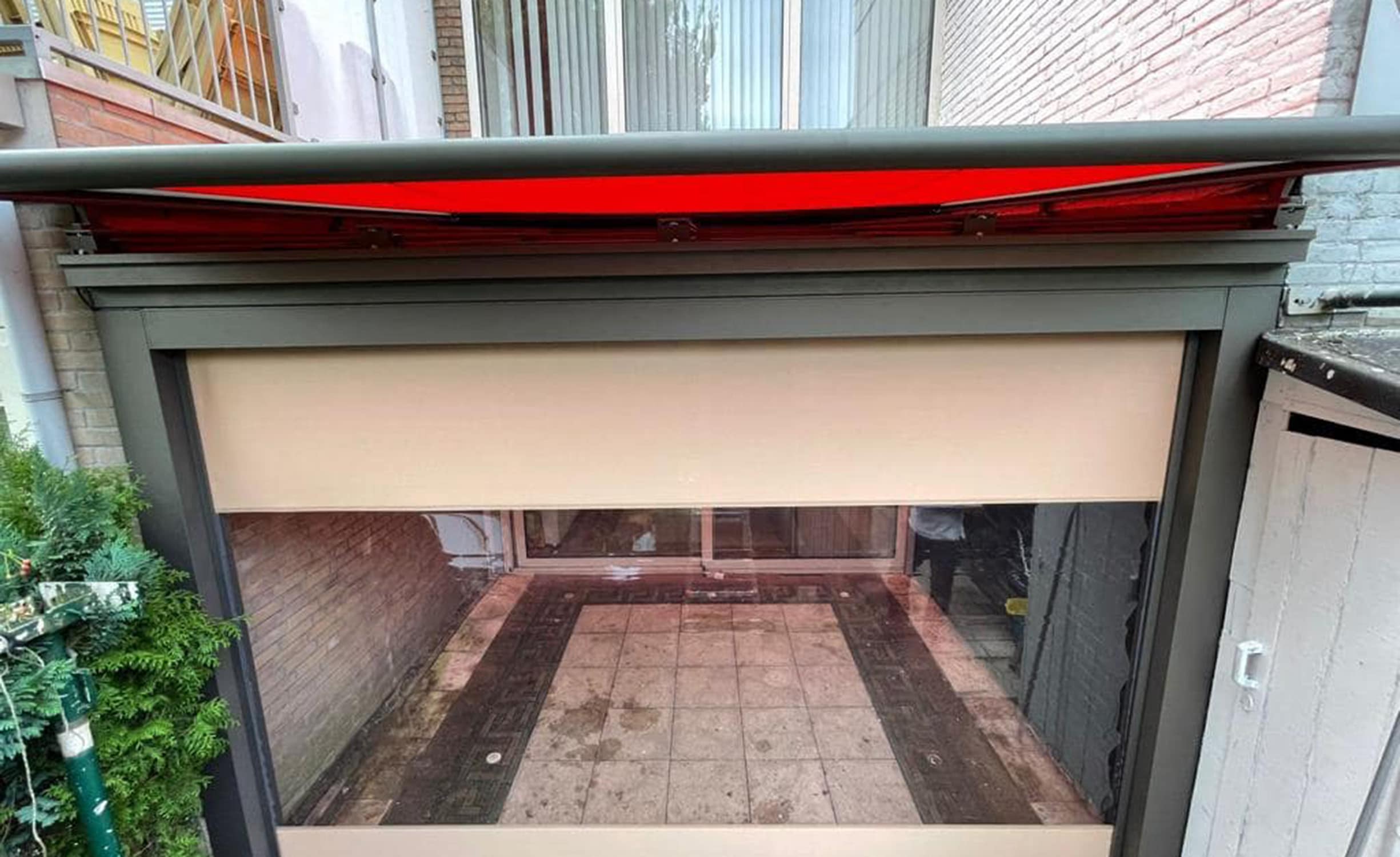 Veranda con tenda da sole